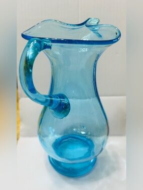 Vintage Italian hand blown pitcher with ruffled edge & curved handle.